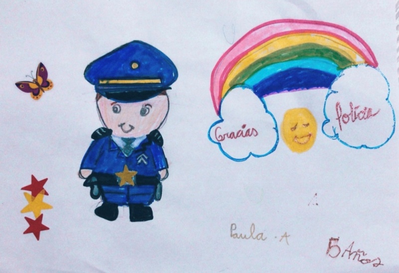 Dibujo en el que se puede ver a un policía sonriendo acompañado de un arcoíris, y las palabras gracias policía